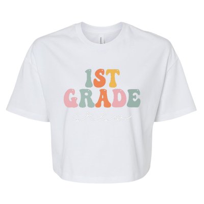 1st Grade Crew Retro Groovy Funny Happy First Day Of School Bella+Canvas Jersey Crop Tee