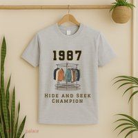 1987 Hide And Seek Champion Bigfoot T-Shirt