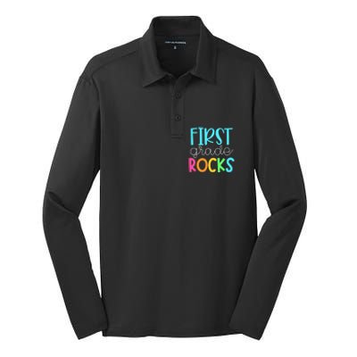 1st Teacher Team First Grade Rocks First Day Of Back To School Silk Touch Performance Long Sleeve Polo