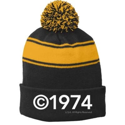 1974 U.S.A. All Rights Reserved. Birthday Year Stripe Pom Pom Beanie