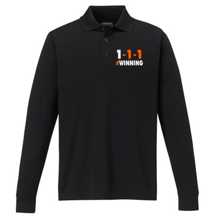 111 #Winning Cleveland Football Performance Long Sleeve Polo