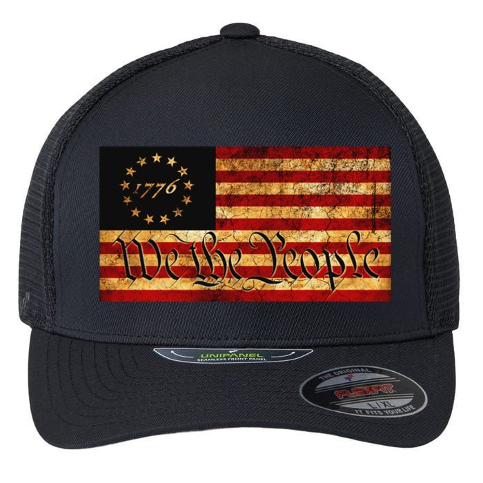 1776 We The People US Flag Visually Aged And Distressed Flexfit Unipanel Trucker Cap