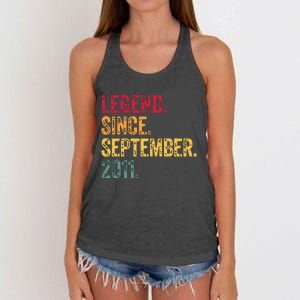 11 Years Old Legend Since September 2011 11th Birthday Gift Women's Knotted Racerback Tank