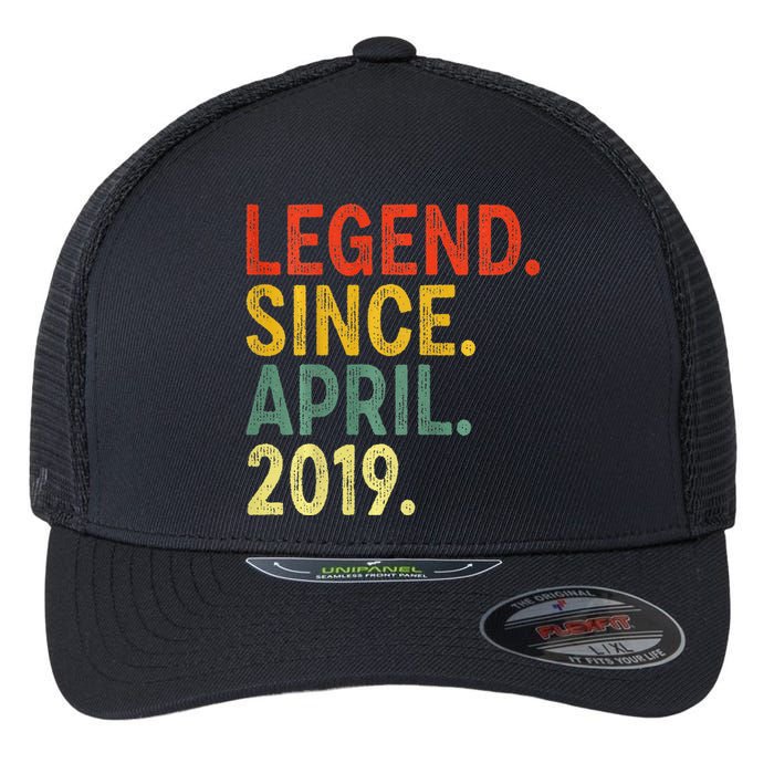 4 Year Old Legend Since April 2019 4th Birthday Flexfit Unipanel Trucker Cap