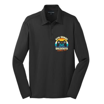 6Th Grade Unlocked Level Up Gamer Back To School Sixth Grade Gift Silk Touch Performance Long Sleeve Polo