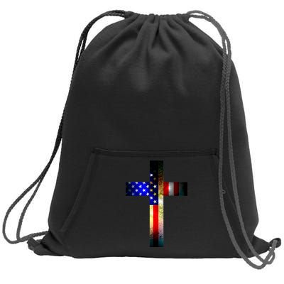 A christian cross comprised of the American Flag Sweatshirt Cinch Pack Bag