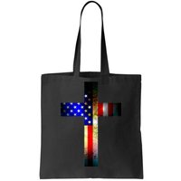 A christian cross comprised of the American Flag Tote Bag