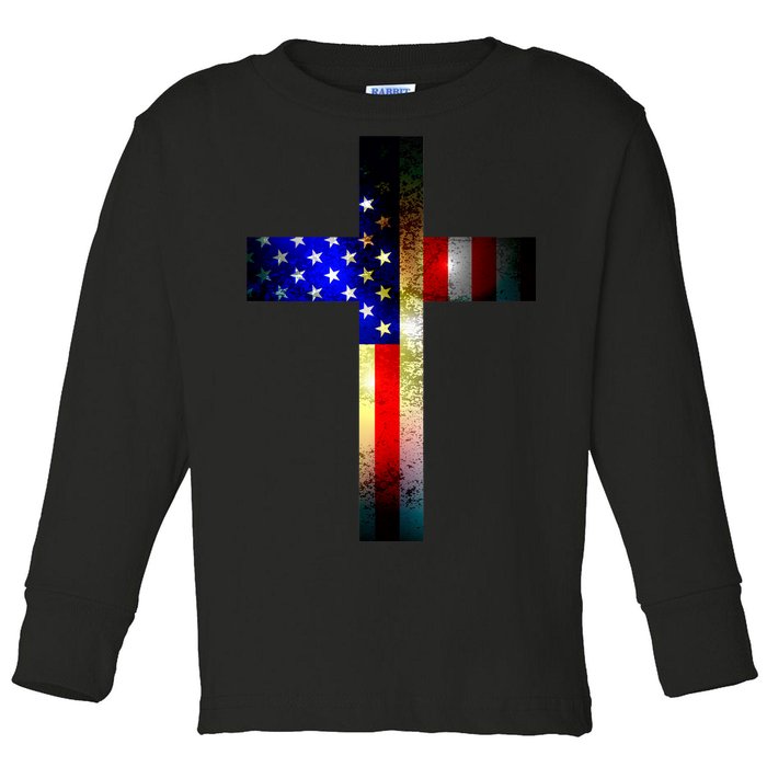 A christian cross comprised of the American Flag Toddler Long Sleeve Shirt