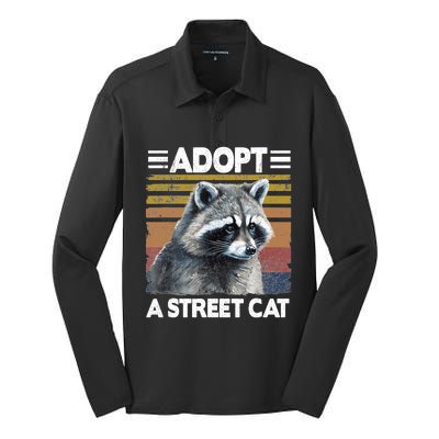 Adopt A Cat Street Watercolor Raccoon Silk Touch Performance Long Sleeve Polo