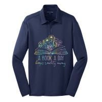 A Book A Day Keeps Reality Away Funny Reading Book Lovers Silk Touch Performance Long Sleeve Polo