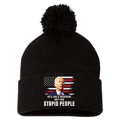 Anti Biden Hes Like A Presidentbut For Stupid People Flag Pom Pom 12in Knit Beanie