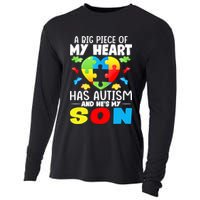 A Big Piece Of My Heart Has Autism And He's My Son Autism Gift Cooling Performance Long Sleeve Crew