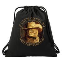 At Cowboy A CatS Gotta Do Funny Cat With Cowboy Hat Drawstring Bag