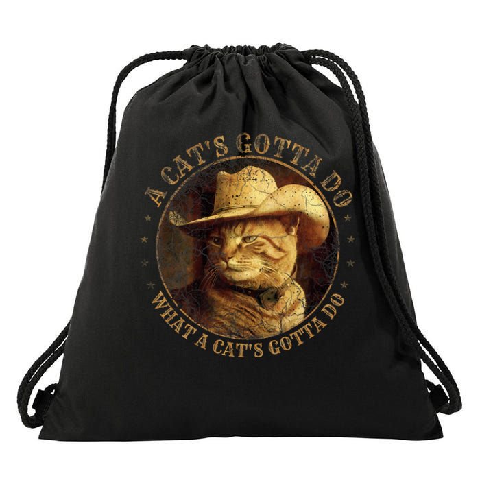 At Cowboy A CatS Gotta Do Funny Cat With Cowboy Hat Drawstring Bag