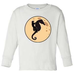 A Cowboy Riding A Seahorse Silhouetted Against A Full Moon Toddler Long Sleeve Shirt