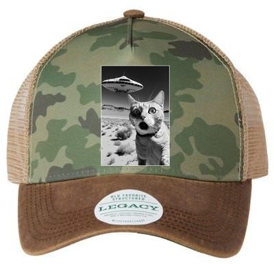 A cat taking a selfie with a ufo spaceship funny pun meme Legacy Tie Dye Trucker Hat
