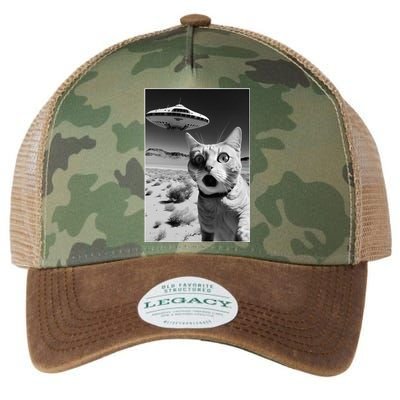 A cat taking a selfie with a ufo spaceship funny pun meme Legacy Tie Dye Trucker Hat