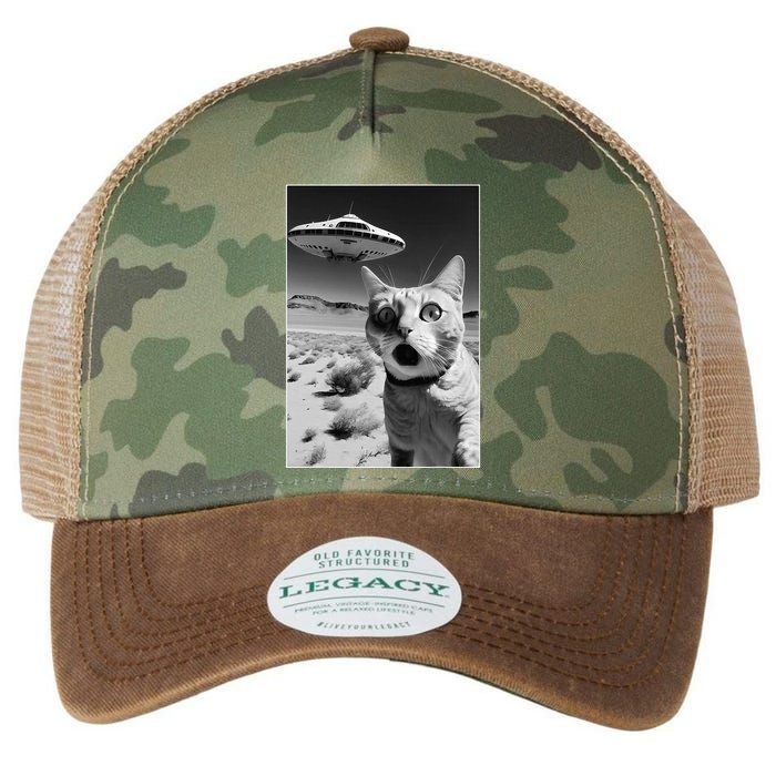 A cat taking a selfie with a ufo spaceship funny pun meme Legacy Tie Dye Trucker Hat
