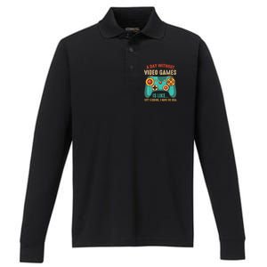 A DAY WITHOUT VIDEO GAMES IS LIKE Funny Gaming Gamer Performance Long Sleeve Polo