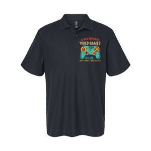 A DAY WITHOUT VIDEO GAMES IS LIKE Funny Gaming Gamer Softstyle Adult Sport Polo