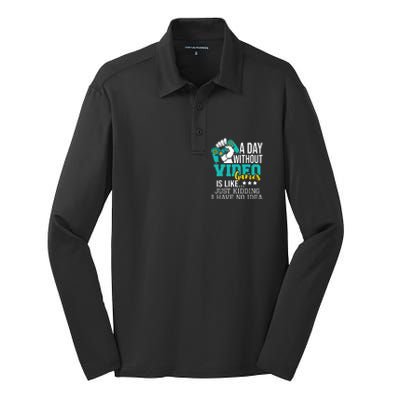 A Day Without Video Games Is Like Funny Gaming Gamer Silk Touch Performance Long Sleeve Polo