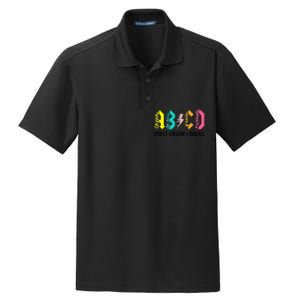 ABCD First Grade Rocks Back To School 1st Grade Teacher Dry Zone Grid Polo