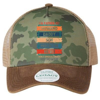 A Father Is Husband Daddy Son Protector Hero Fathers Day Legacy Tie Dye Trucker Hat