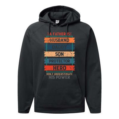 A Father Is Husband Daddy Son Protector Hero Fathers Day Performance Fleece Hoodie