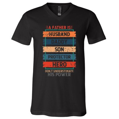 A Father Is Husband Daddy Son Protector Hero Fathers Day V-Neck T-Shirt