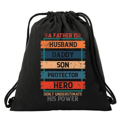 A Father Is Husband Daddy Son Protector Hero Fathers Day Drawstring Bag