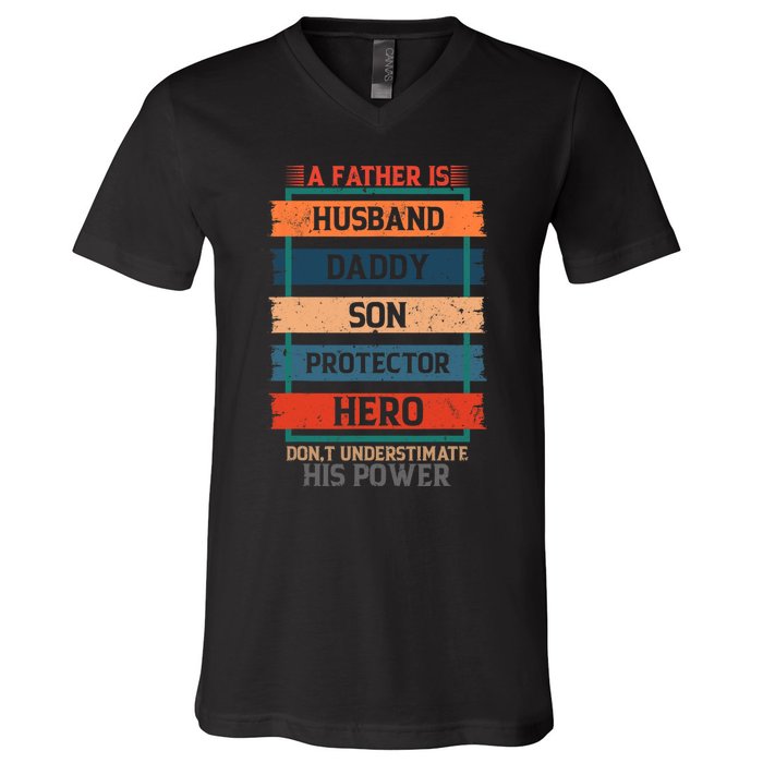 A Father Is Husband Daddy Son Protector Hero Fathers Day V-Neck T-Shirt