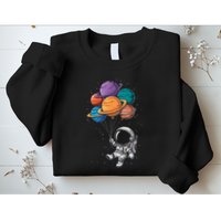 Astronaut Holding Planet Balloons Floating In Space Sweatshirt