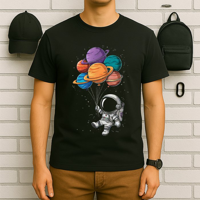 Astronaut Holding Planet Balloons Floating In Space T-Shirt