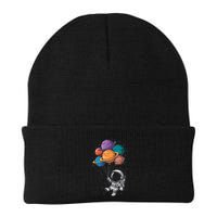Astronaut Holding Planet Balloons Floating In Space Beanie