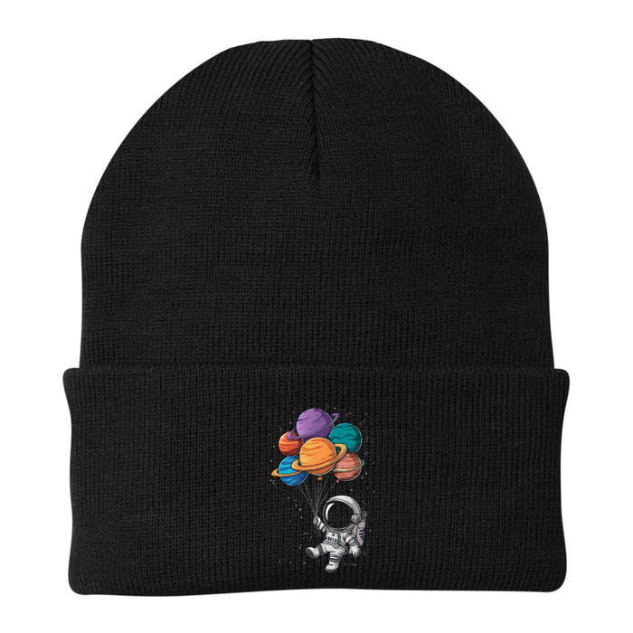 Astronaut Holding Planet Balloons Floating In Space Beanie