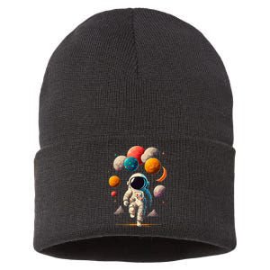 Astronaut Holding Solar System Planets Balloons in Space Sustainable Knit Beanie