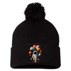 Astronaut Holding Solar System Planets Balloons in Space Pom Pom 12in Knit Beanie