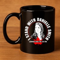 April Hutchinson Wearing I Stand With Danielle Smith Bella Canvas Signature 11oz C Handle Ceramic Mug