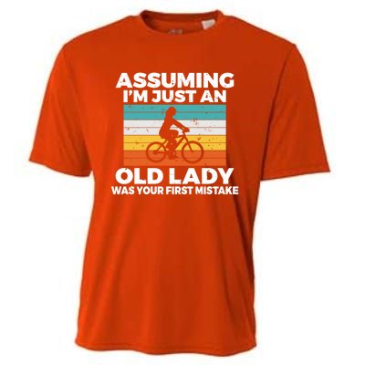 Assuming Im Just An Old Lady Was Your First Mistake Biking Funny Gift Cooling Performance Crew T-Shirt