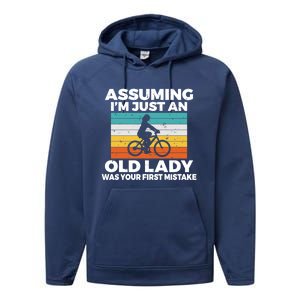 Assuming Im Just An Old Lady Was Your First Mistake Biking Gift Performance Fleece Hoodie