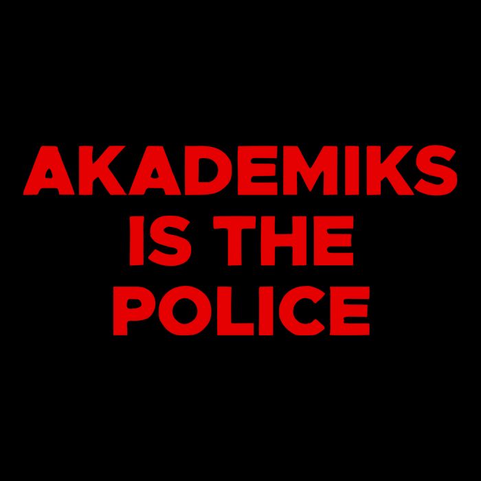 Akademiks Is The P.O.L.I.C.E Stripe Pom Pom Beanie