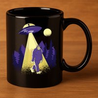 Aliens Kidnapping Bigfoot 11oz C Handle Ceramic Mug