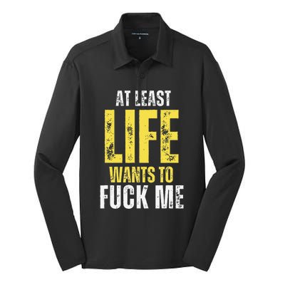 At Least Life Wants To Fuck Me Funny Silk Touch Performance Long Sleeve Polo