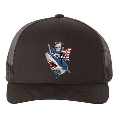 Abraham Lincoln Riding A Shark 4th Of July Yupoong Adult 5-Panel Trucker Hat