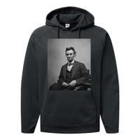 Abraham Lincoln Seated And Holding His Spectacles And A Pencil On Feb 1865 Performance Fleece Hoodie