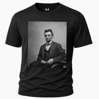 Abraham Lincoln Seated And Holding His Spectacles And A Pencil On Feb 1865 Performance Shirt