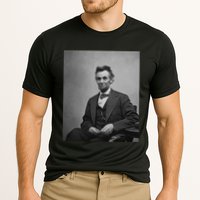 Abraham Lincoln Seated And Holding His Spectacles And A Pencil On Feb 1865 Performance Shirt