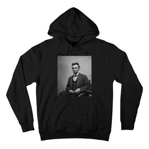 Abraham Lincoln Seated And Holding His Spectacles And A Pencil On Feb 1865 Hoodie