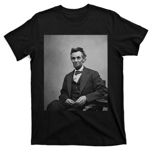 Abraham Lincoln Seated And Holding His Spectacles And A Pencil On Feb 1865 T-Shirt