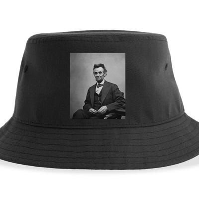 Abraham Lincoln Seated And Holding His Spectacles And A Pencil On Feb 1865 Sustainable Bucket Hat